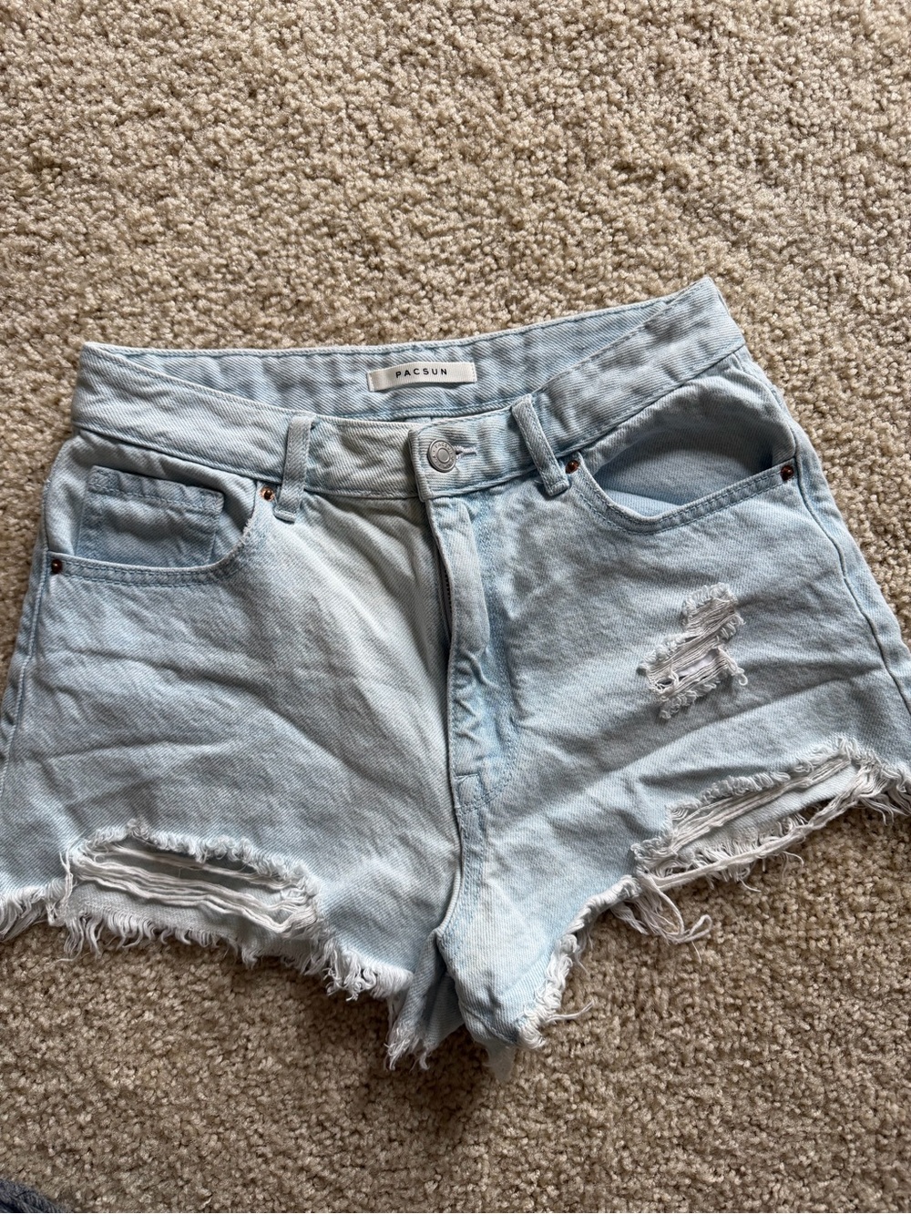 100% cotton, 26, Pacsun high rise festival, raw hem, light wash distressed short